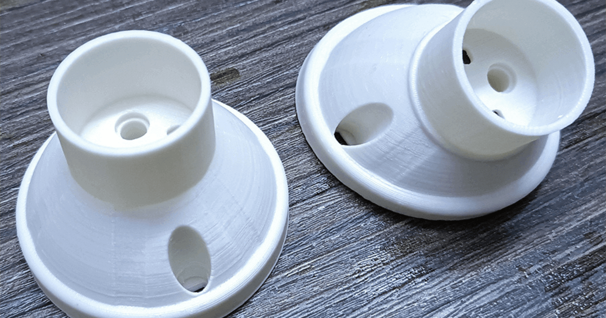 FDM 3D printer using PLA, ABS, and PETG thermoplastics with blue filament.