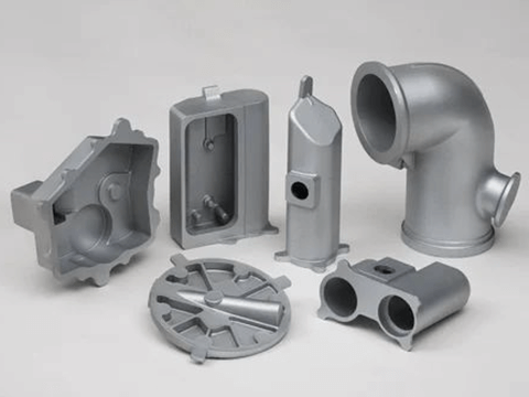  Various investment casting components including pipes and fittings.